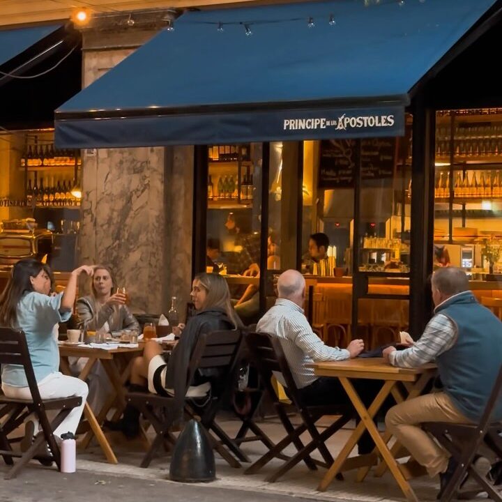 Guests dining on the outdoor terrace of Florería Atlántico in Buenos Aires