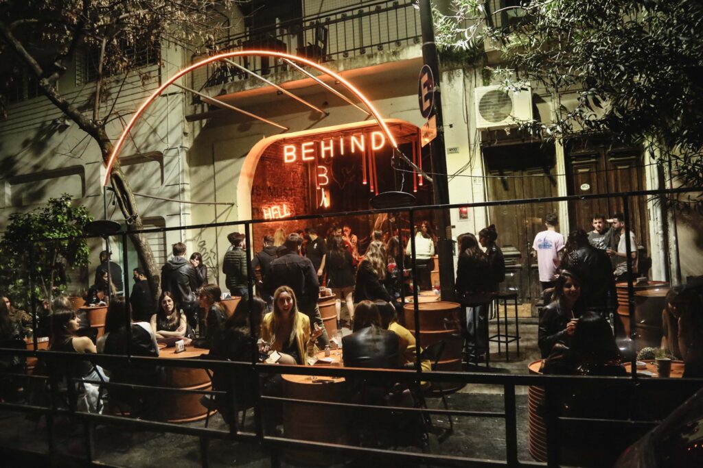 Night view of bars and crowds around Plaza Serrano in Palermo Soho Buenos Aires